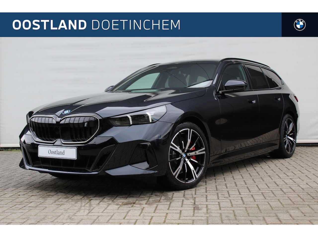 BMW i5 Touring - eDrive40 M Sport / Trekhaak / Panoramadak / Comfort Access / Achteruitrijcamera / Adaptiev - AutoWereld.nl