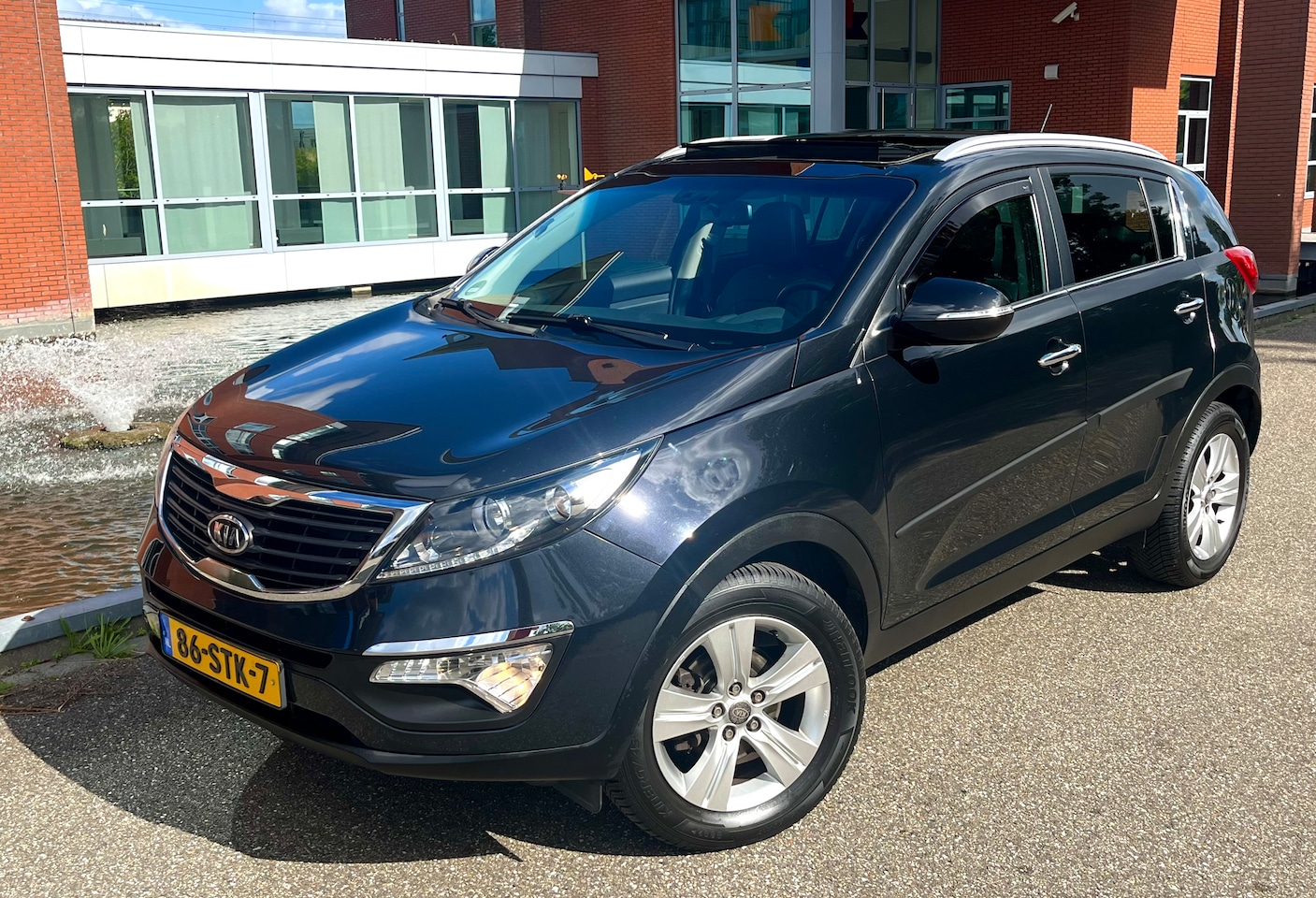 Kia Sportage - 2.0 X-ecutive Plus Pack Panodak, CarPlay, trekhaak, cruise, etc - AutoWereld.nl