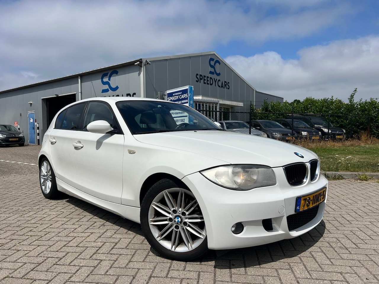BMW 1-serie - 118i High Executive M-Pakket 5DRS Leer Clima - AutoWereld.nl