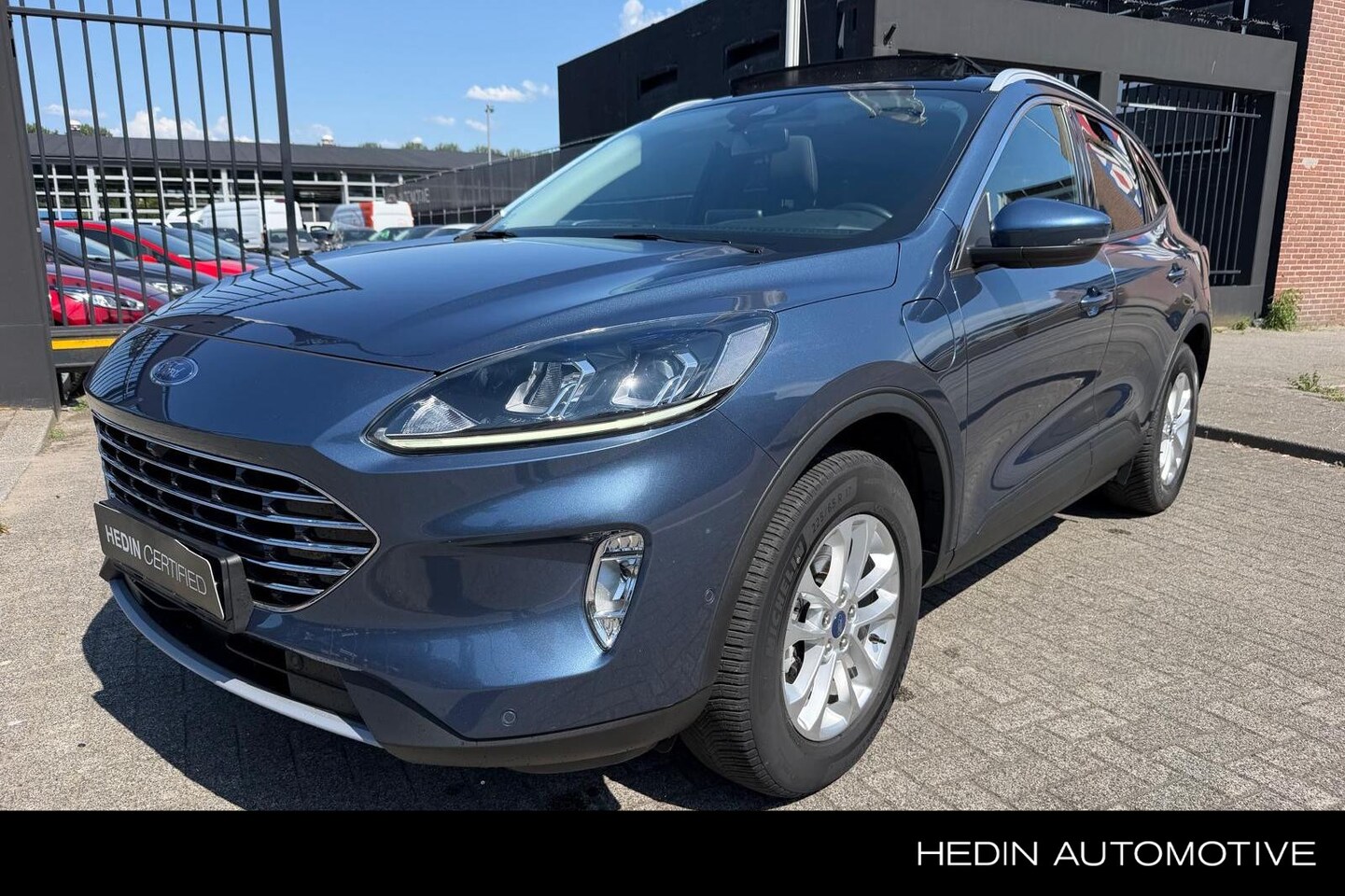 Ford Kuga - 2.5 PHEV Titanium | Panoramadak | Trekhaak wegklapbaar | Winter Pack - AutoWereld.nl