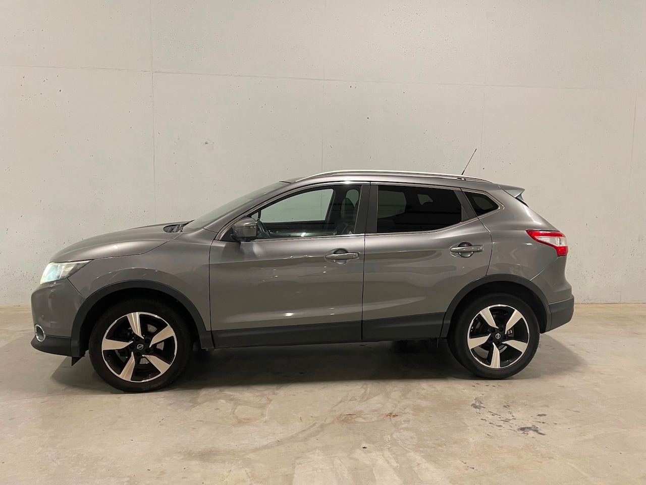 Nissan Qashqai - 1.2 N-Connecta Navi Camera Clima Cruise - AutoWereld.nl
