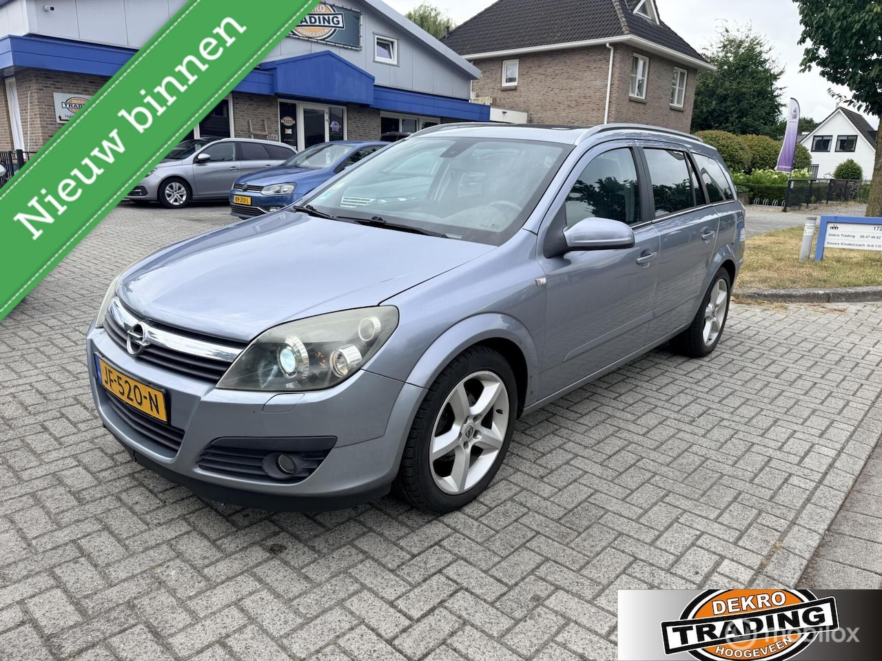 Opel Astra Wagon - 1.8 Cosmo airco panorama dak cruise - AutoWereld.nl