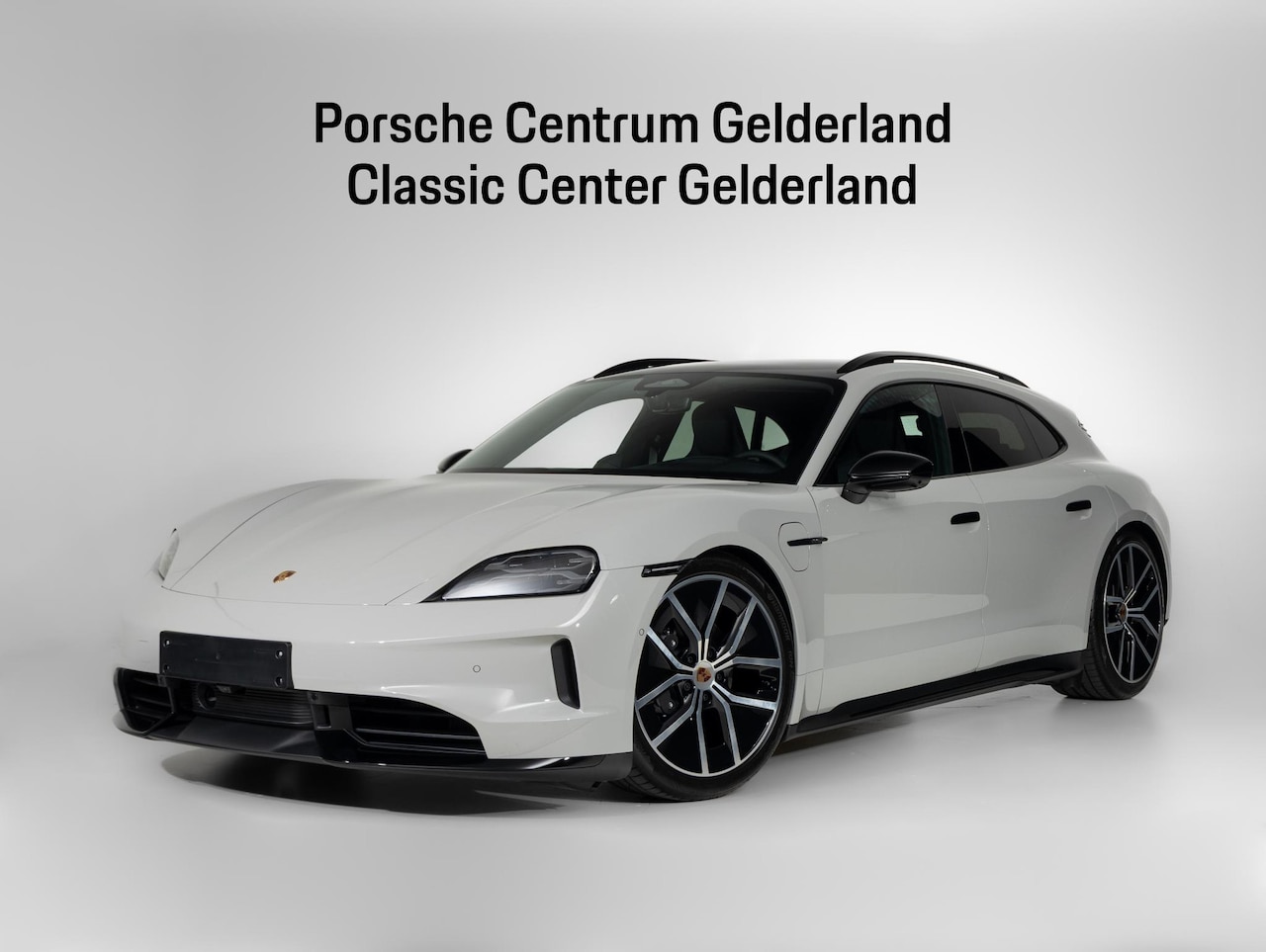Porsche Taycan Sport Turismo - Black Edition - AutoWereld.nl