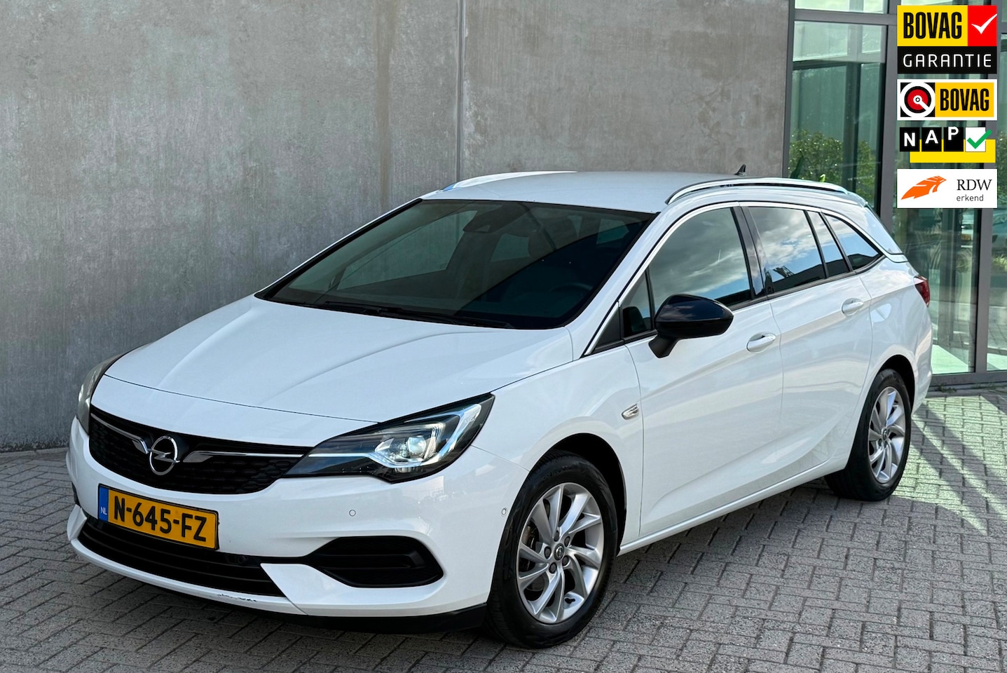 Opel Astra Sports Tourer - 1.2 130pk 2021 Wit CAMERA|1E EIG|NAP - AutoWereld.nl
