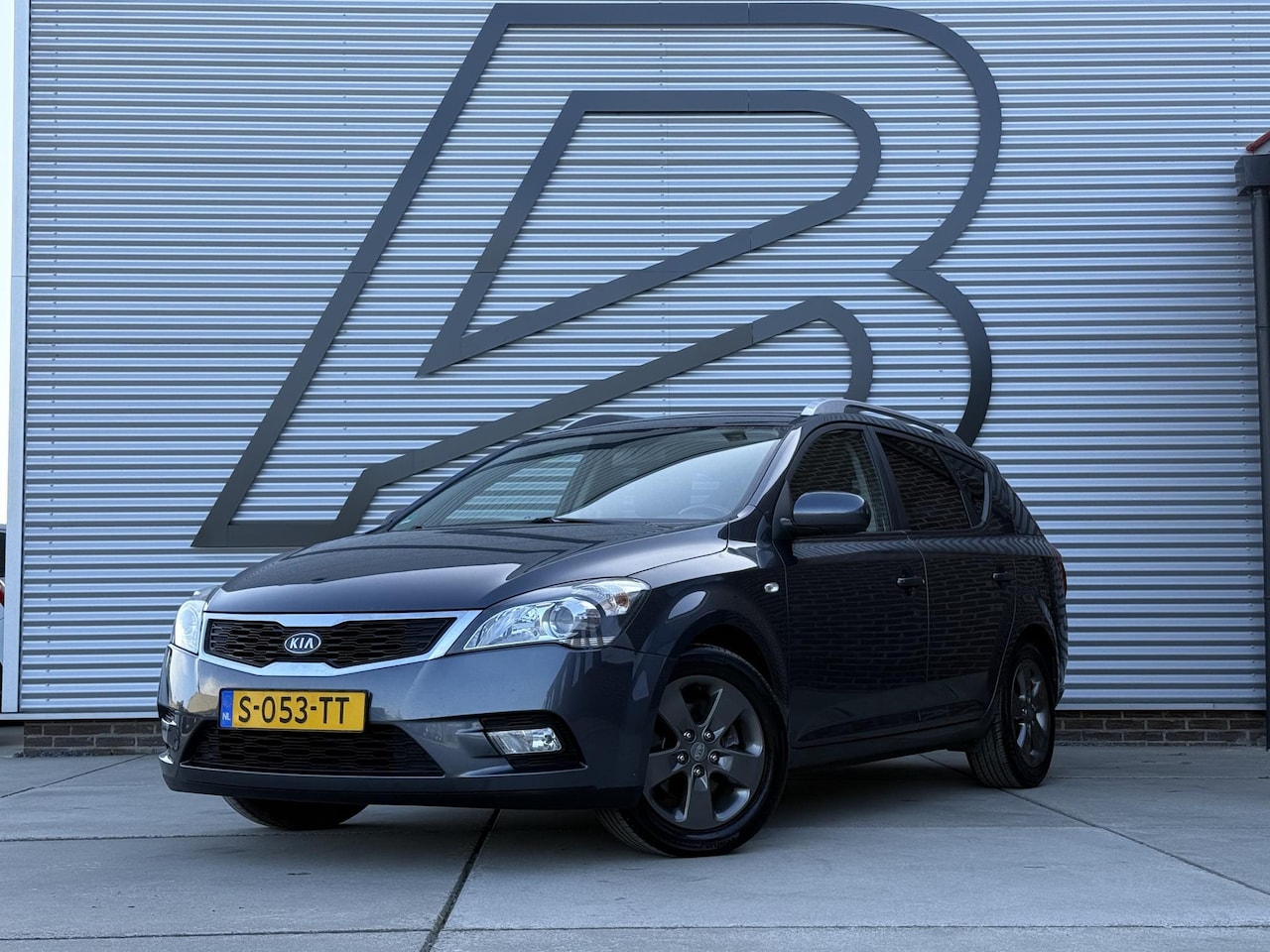 Kia Cee'd - 1.4 CVVT Seven 2e Eigenaar|Navi|Airco|LM Velgen|Bluetooth|Elektr. Ramen|APK tot 04-2027 - AutoWereld.nl