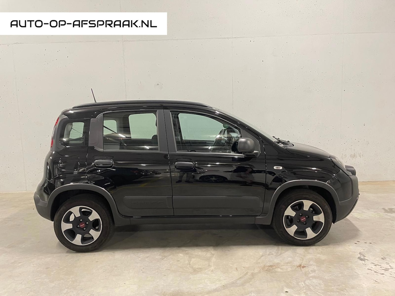 Fiat Panda - 1.0 Hybrid Cross 5drs. Clima Navi Cruise C. - AutoWereld.nl