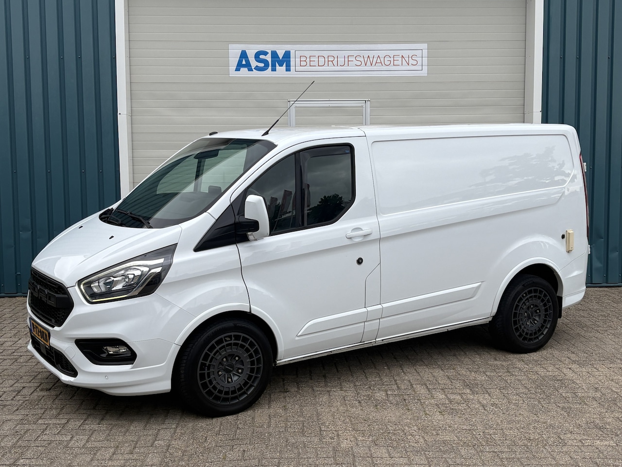 Ford Transit Custom - 310 2.0 170Pk TDCI L1H1 Sport / Cruise / Navi / Trekhaak / Apk t/m 10-11-2026 - AutoWereld.nl