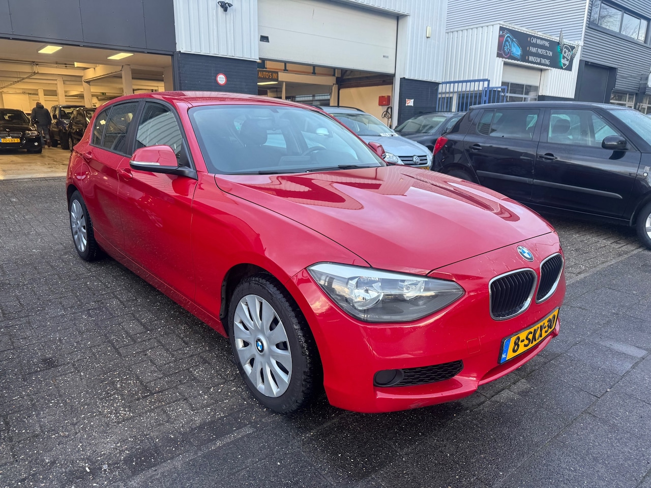 BMW 1-serie - 114i EDE 5 DEURS - AutoWereld.nl