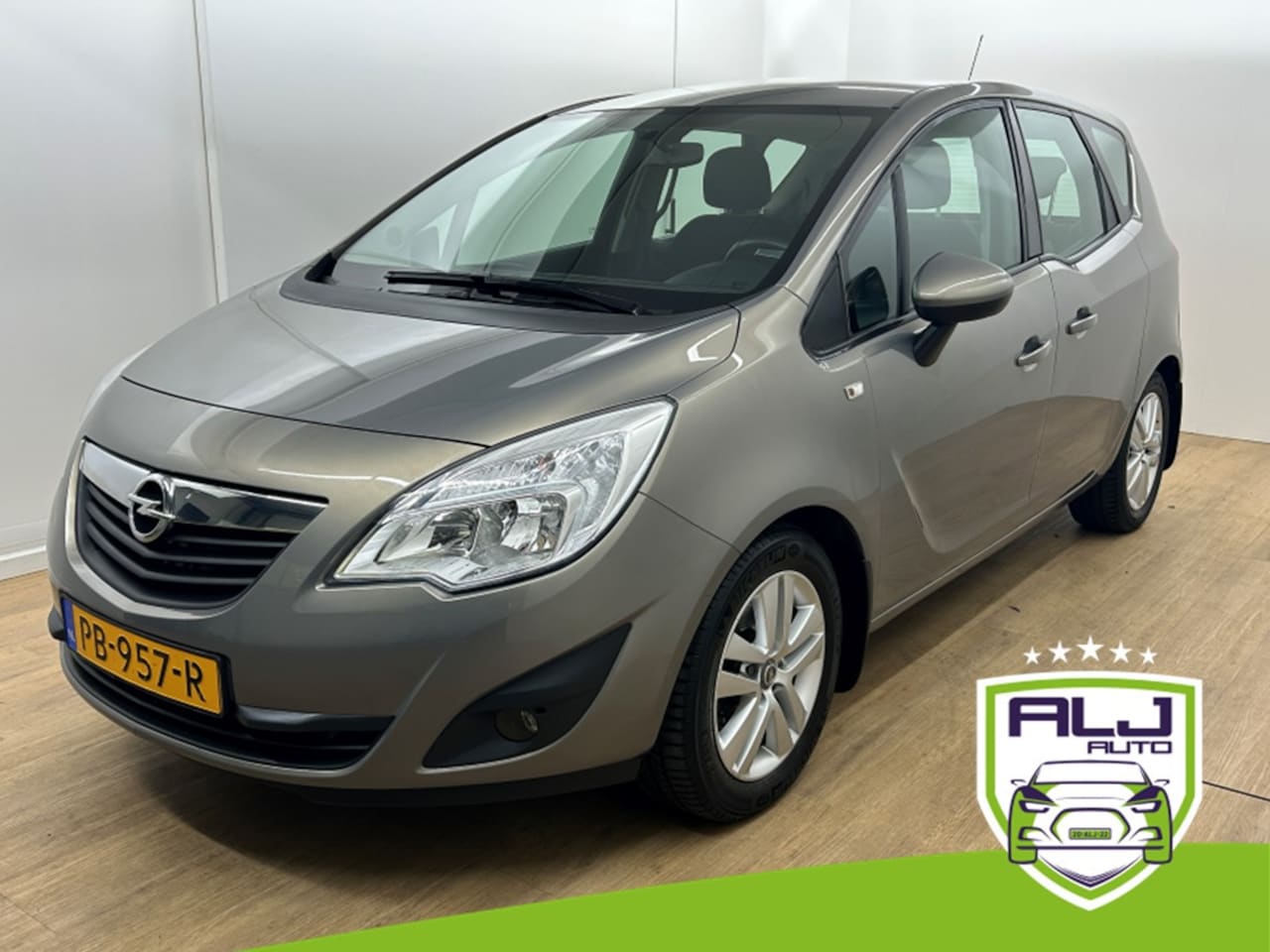 Opel Meriva - Occasion 1.4 Cosmo | Bruin | Tweedehands Opel Meriva | Airco | Trekhaak | Aux audio | Crui - AutoWereld.nl