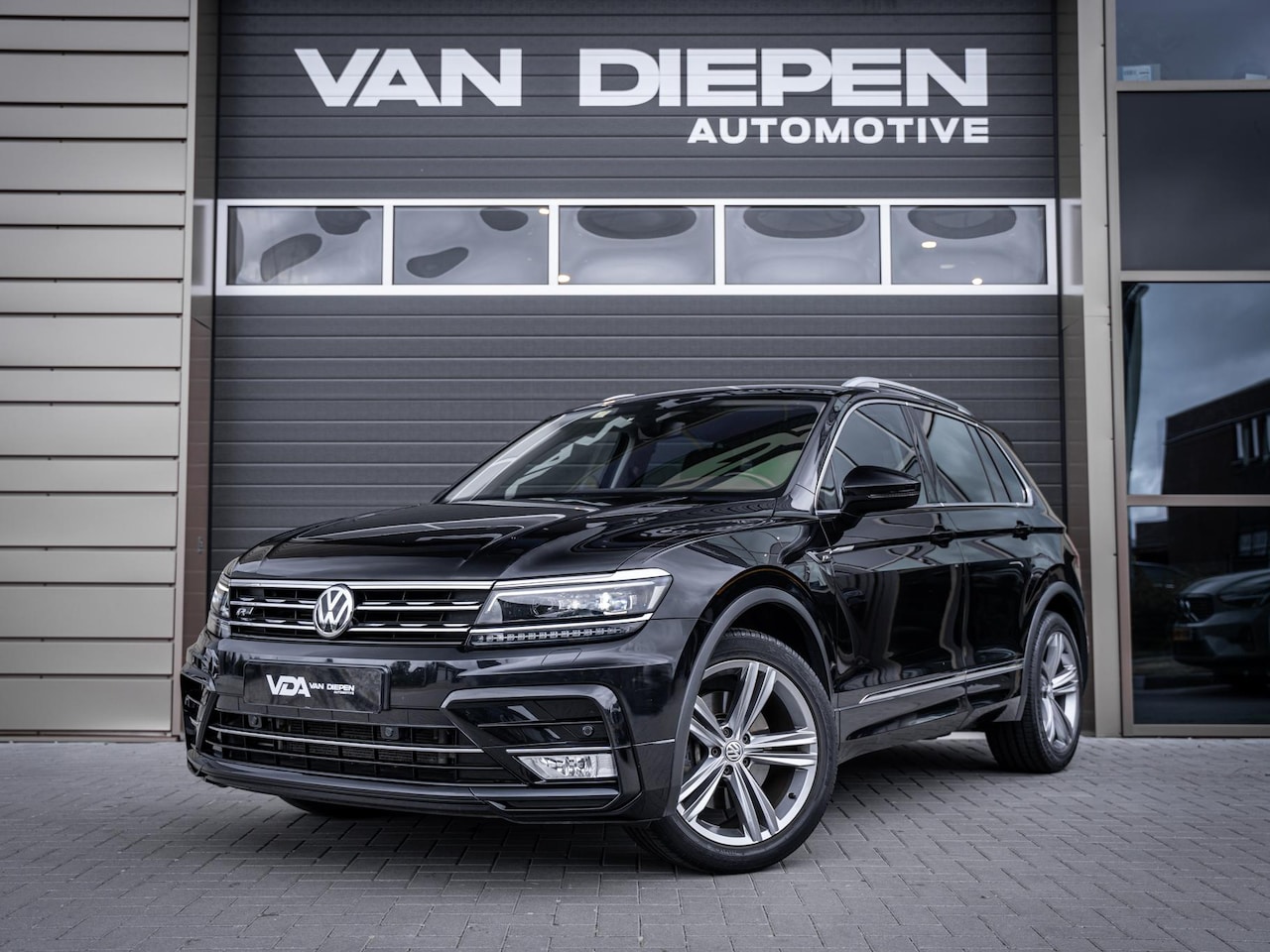 Volkswagen Tiguan - 2.0 TSI 4Motion Highline 2.0 TSI 4Motion Highline - AutoWereld.nl