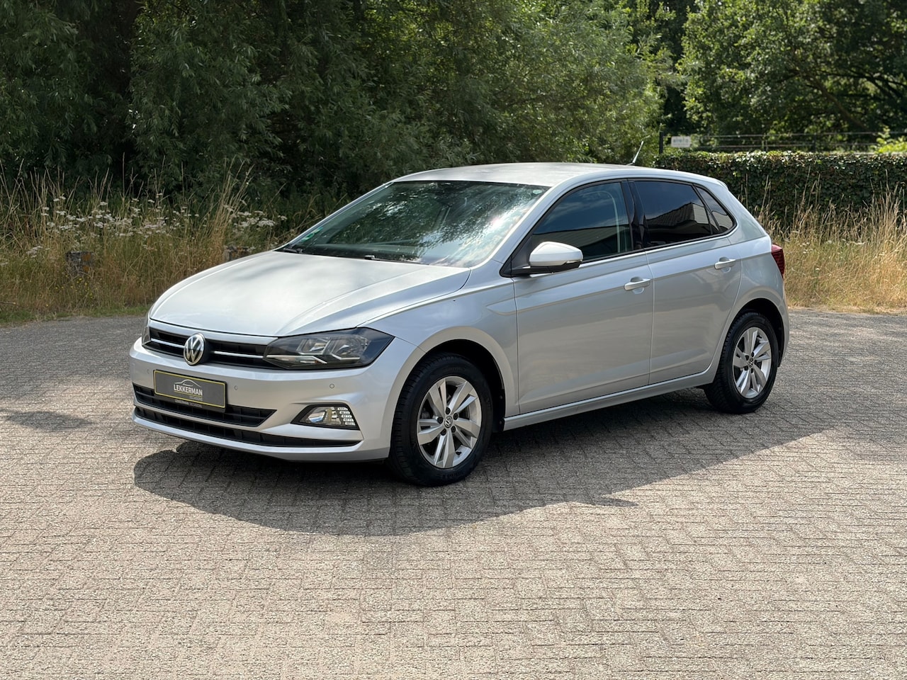 Volkswagen Polo - 1.0 TSI High Line DSG I CAMERA I UNIEKE KM STAND I CRUISE I PDC - AutoWereld.nl