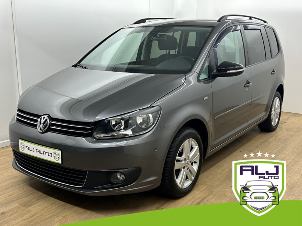 Volkswagen Touran - Occasion 1.4 TSI Comfortline 7p. | Grijs | Tweedehands Volkswagen Touran | Airco | Cruise - AutoWereld.nl