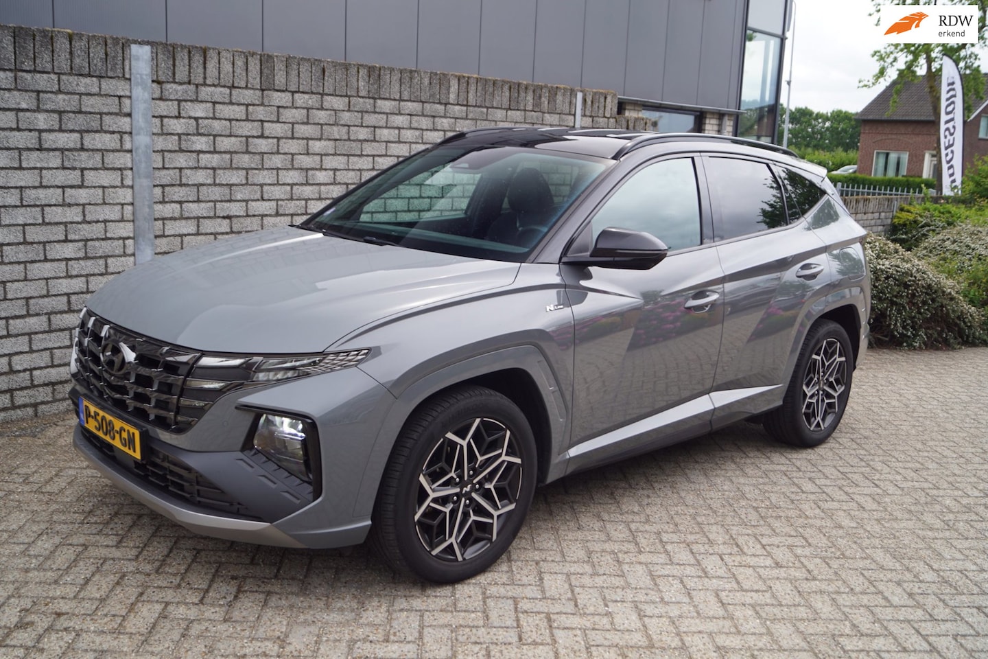 Hyundai Tucson - 1.6 T-GDI HEV N Line Autom Leder/Alcantara Stoel/Stuur en A Bankverw Navi Camera Adaptieve - AutoWereld.nl