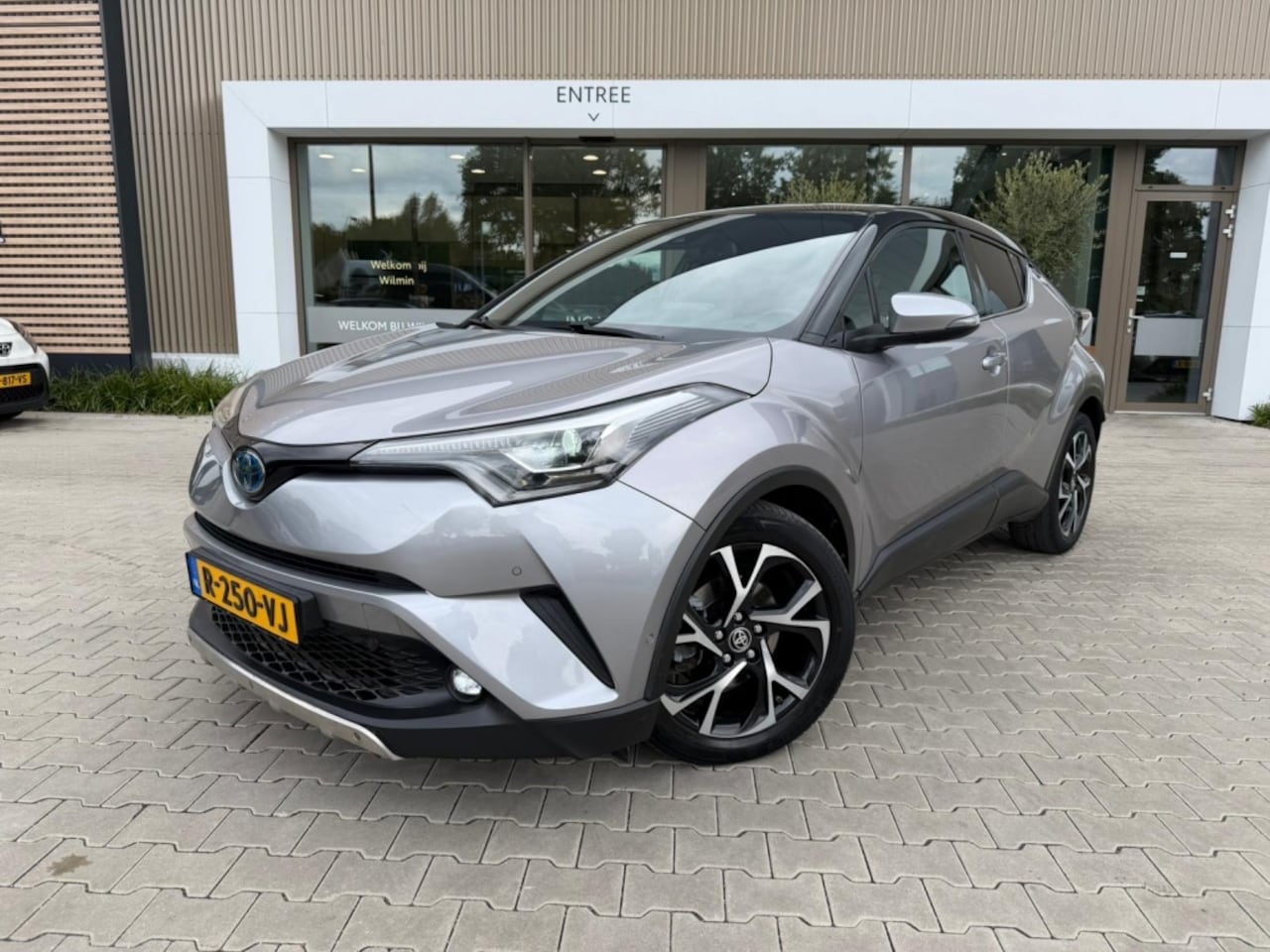 Toyota C-HR - 1.8 Hybrid Bi-Tone Edition | Lederen bekleding | Stoelverwarming - AutoWereld.nl