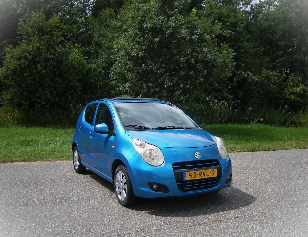 Suzuki Alto - 1.0 Exclusive . 5 Drs . Airco . SCHUIF / Cabrio dak . uniek ...LMV . enz - AutoWereld.nl