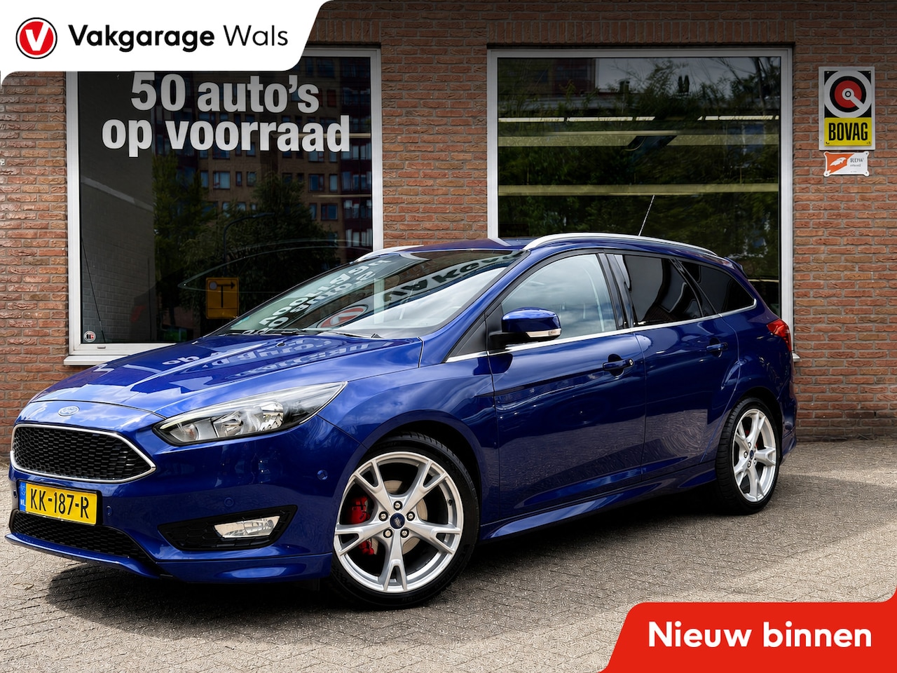 Ford Focus Wagon - 1.0 ST line Titanium | Airco | Navi | Camera | Cruise | Voorruitverwarming | ST look - AutoWereld.nl