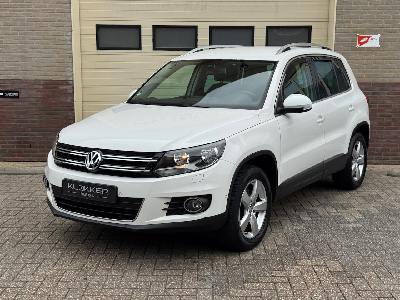 Volkswagen Tiguan - 1.4 TSI Sport&Style PDC|Camera|Trekhaak|Stoelverw. - AutoWereld.nl