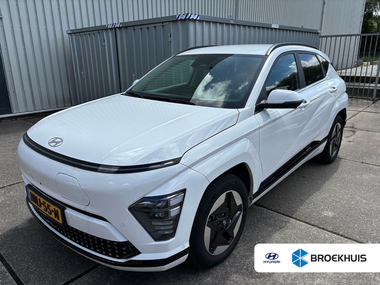 Hyundai Kona Electric - Premium 65.4 kWh | Achterbank in delen neerklapbaar | Achterruitverwarming | Achterspoiler - AutoWereld.nl
