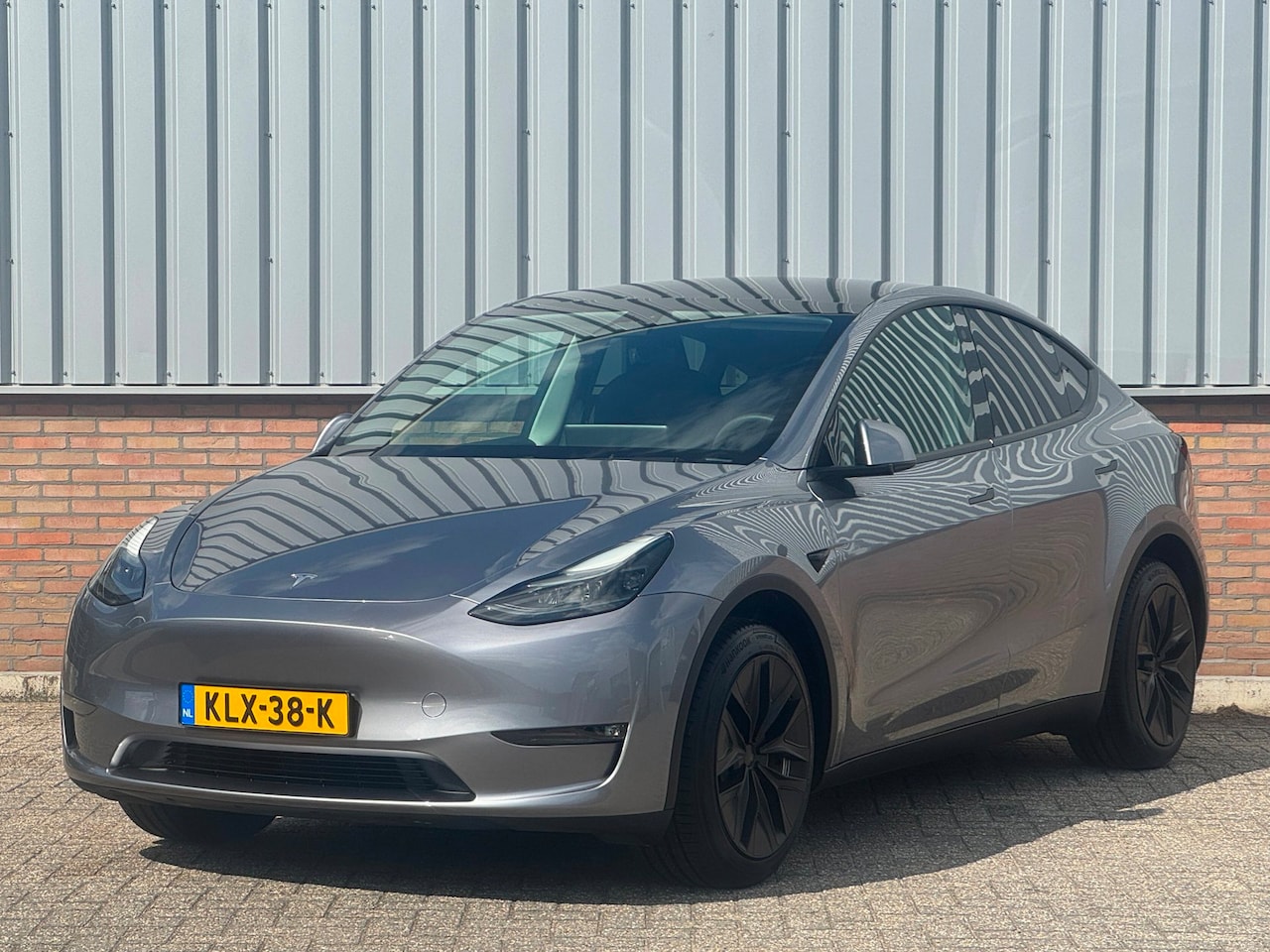 Tesla Model Y - Quicksilver Long Range AWD 75KW 96% SoH/ Trekhaak - AutoWereld.nl