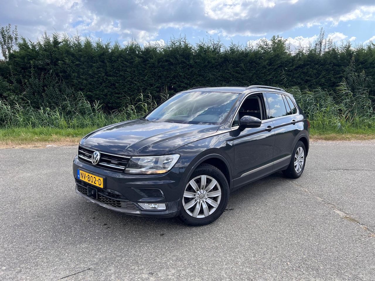 Volkswagen Tiguan - 2.0 TDI Comfortline AUTOMAAT SPORT PDC - AutoWereld.nl