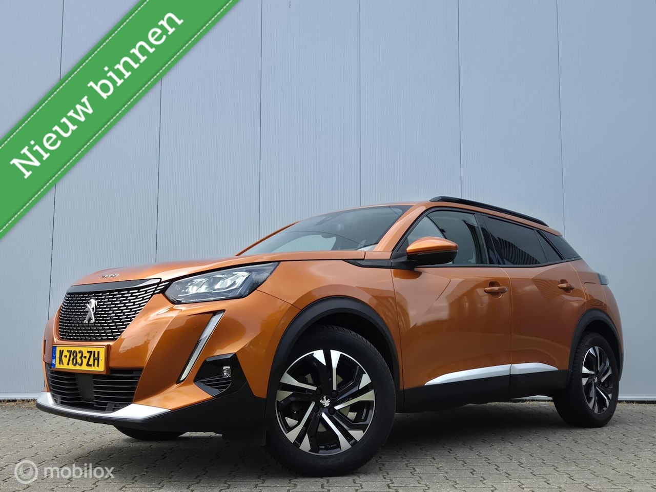 Peugeot 2008 - 1.2 PURETECH ALLURE AUTOMAAT/CAMERA/FULL LED/KEYLESS/HALF-LEDER/I-COCKPIT - AutoWereld.nl