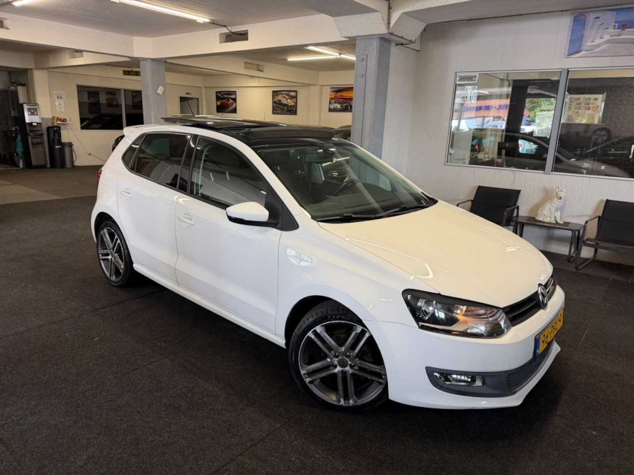 Volkswagen Polo - 1.2 TSI Highline *NAP*PANO*NAVI*Velgen - AutoWereld.nl