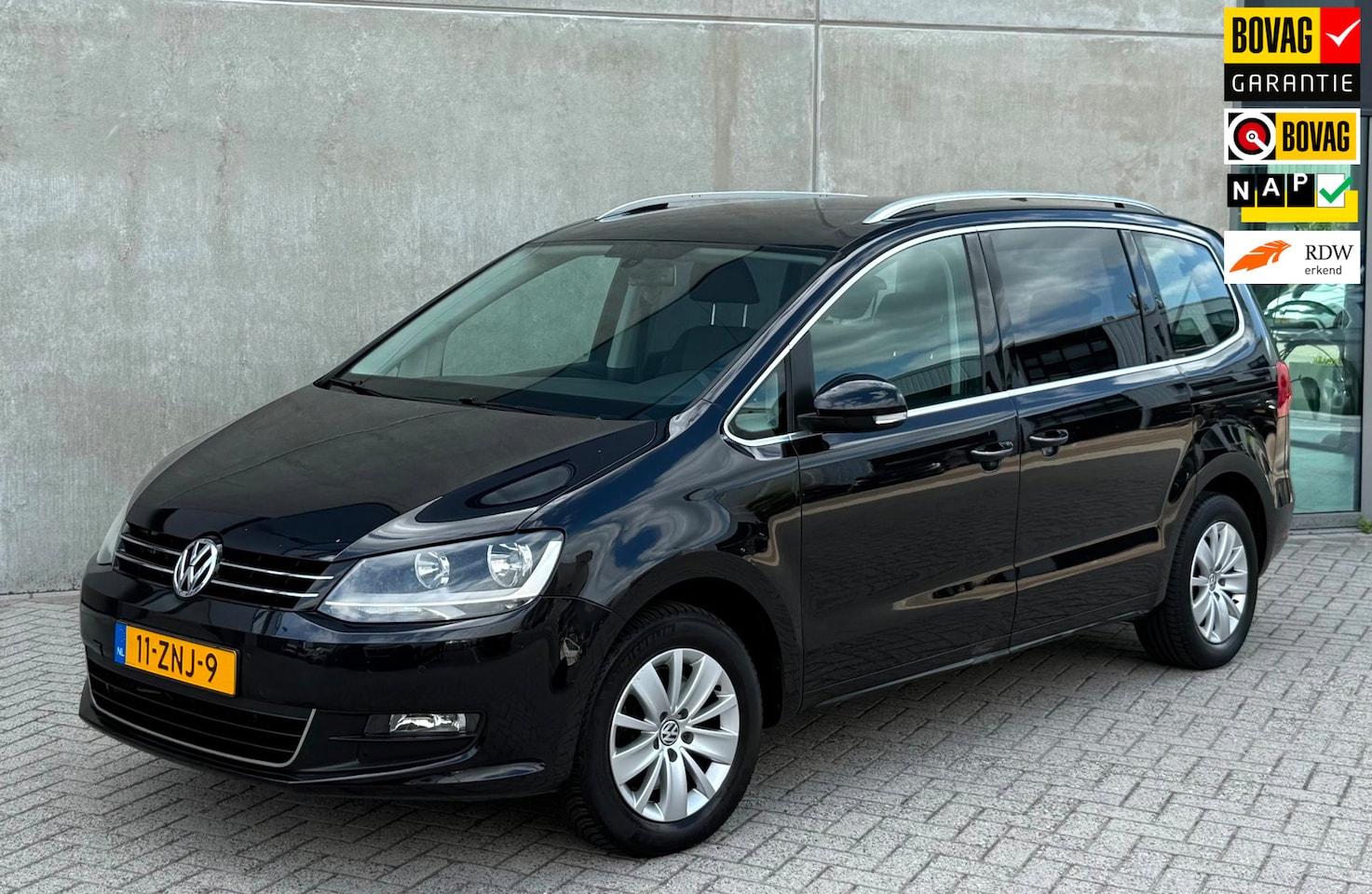 Volkswagen Sharan - 1.4 TSI HL 7p. 2013 Zwart NAVI|PDC|2E EIG - AutoWereld.nl