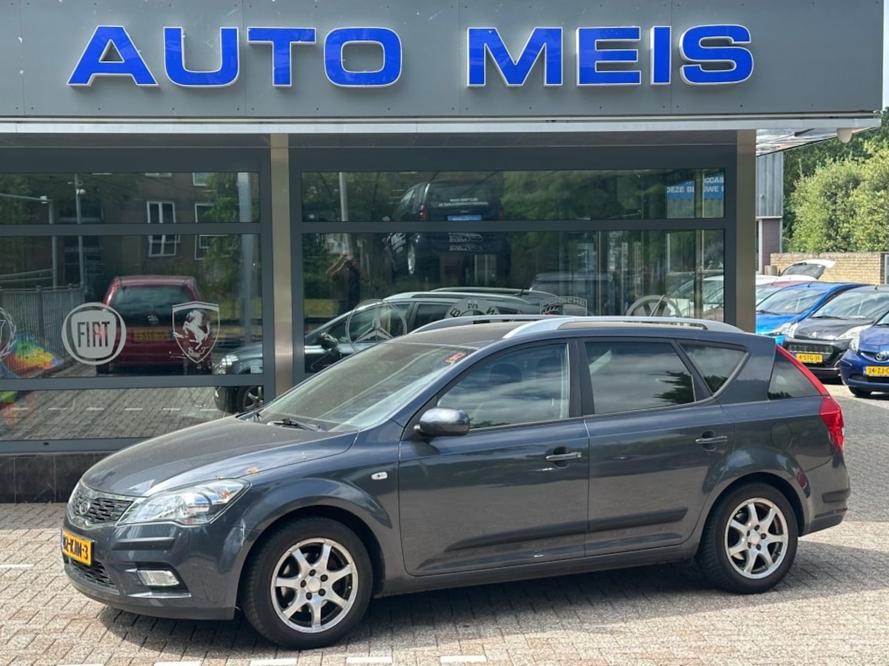 Kia Cee'd - 1.4 CVVT Seven Navi Deze auto heeft tikkend geluid Alleen VOOR Export - AutoWereld.nl