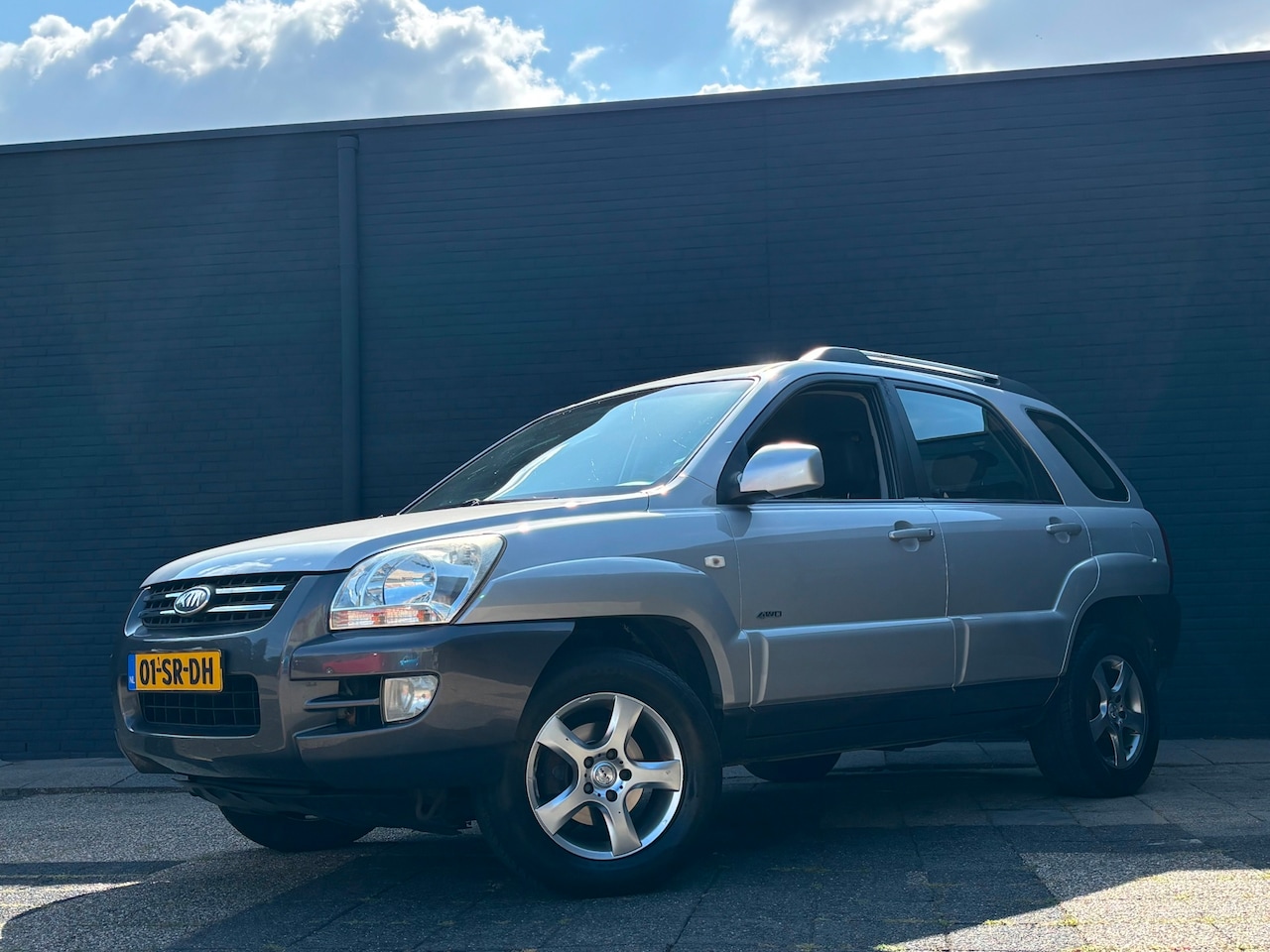 Kia Sportage - 2.7 V6 Adventure 4WD|Automaat|Leder|Trekhaak - AutoWereld.nl