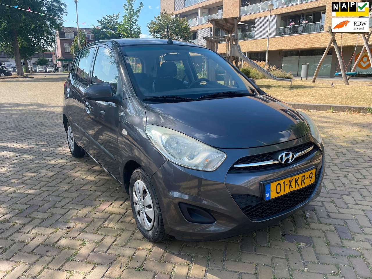 Hyundai i10 - 1.1 i-Drive Cool 1.1 i-Drive Cool, 5drs, Airco, Elektr ramen, Radio-CD/MP3 speler, 2e eig afk, Geen import, - AutoWereld.nl