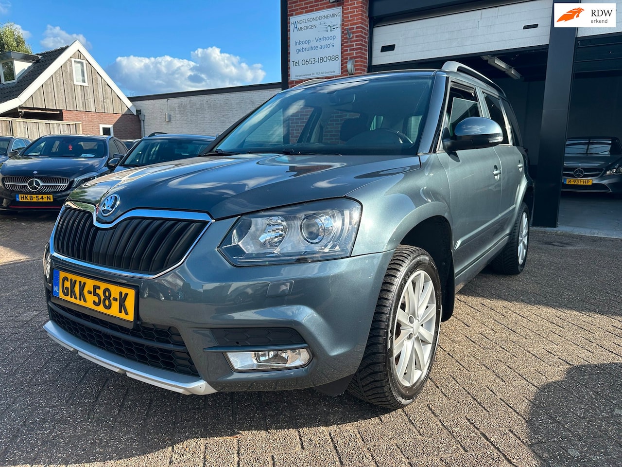 Skoda Yeti - 1.2 TSI Greentech Style AUTOMAAT-CRUISE-PDC-NAVI - AutoWereld.nl