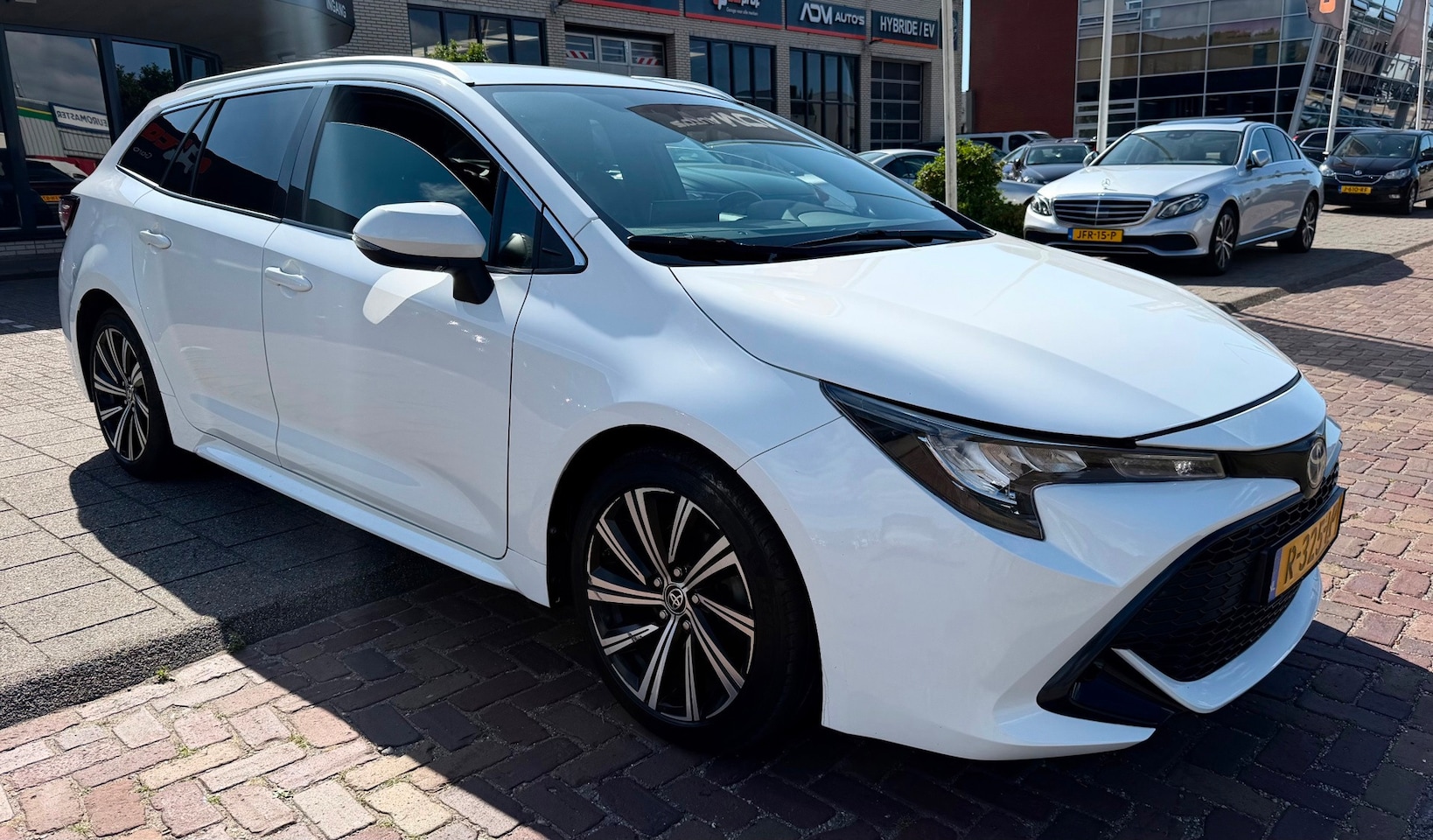 Toyota Corolla Touring Sports - 1.8 Hybrid Dynamic 1.8 Hybrid Dynamic - AutoWereld.nl