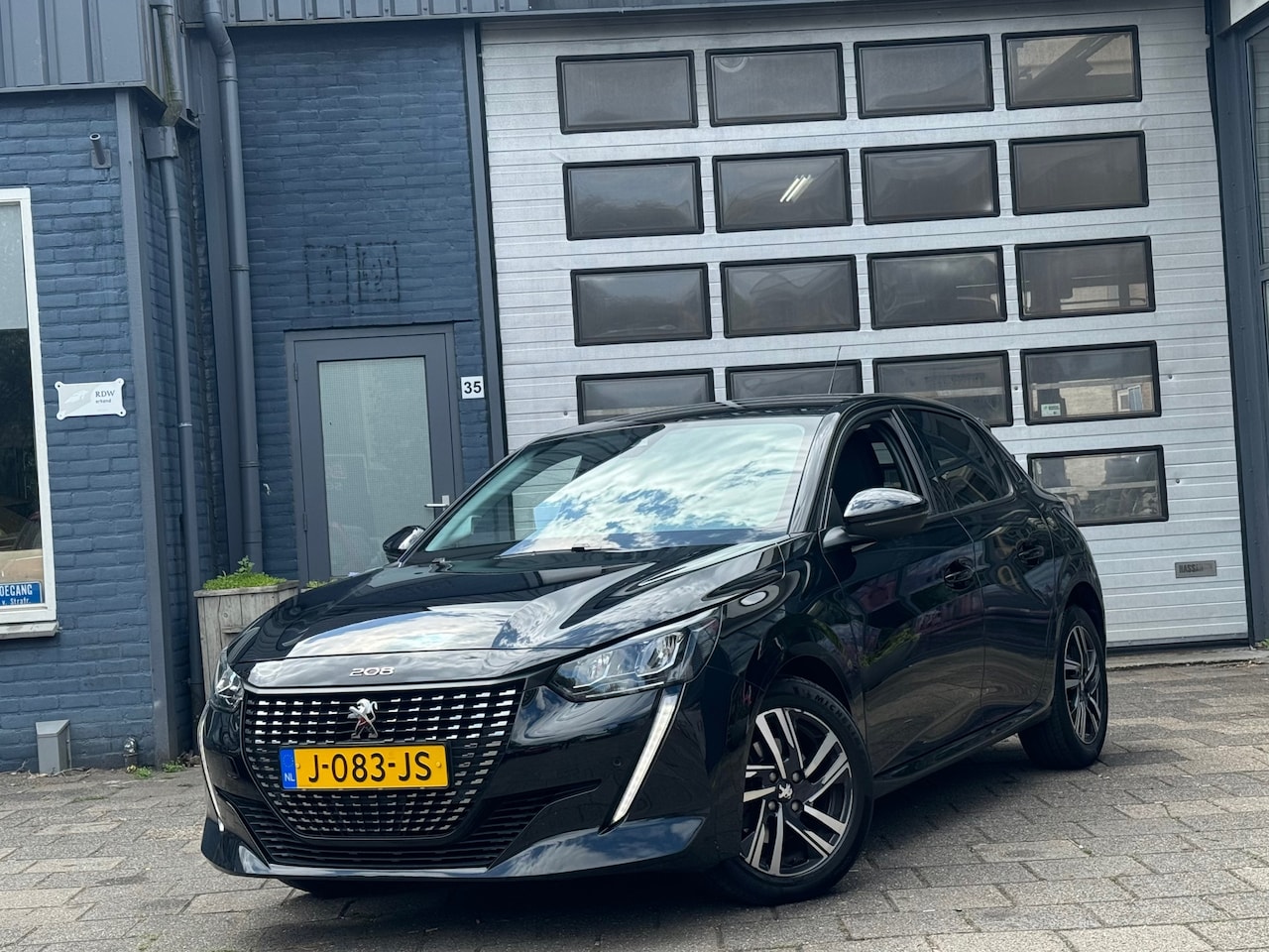 Peugeot 208 - 1.2 PureTech Allure | Clima | Cruise |Camera| Navi | PDC V+A - AutoWereld.nl