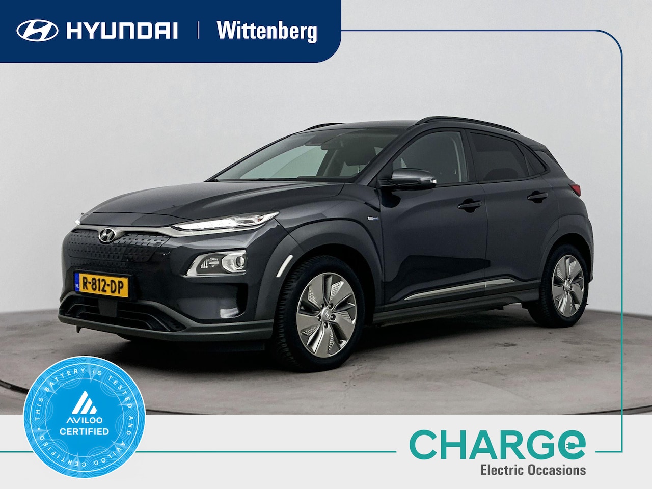 Hyundai Kona Electric - EV COMFORT SMART 64 kWh | SOH 95.1% | NAVIGATIE | HUD | STOEL/STUURVERWARMING | ACHTERUITR - AutoWereld.nl
