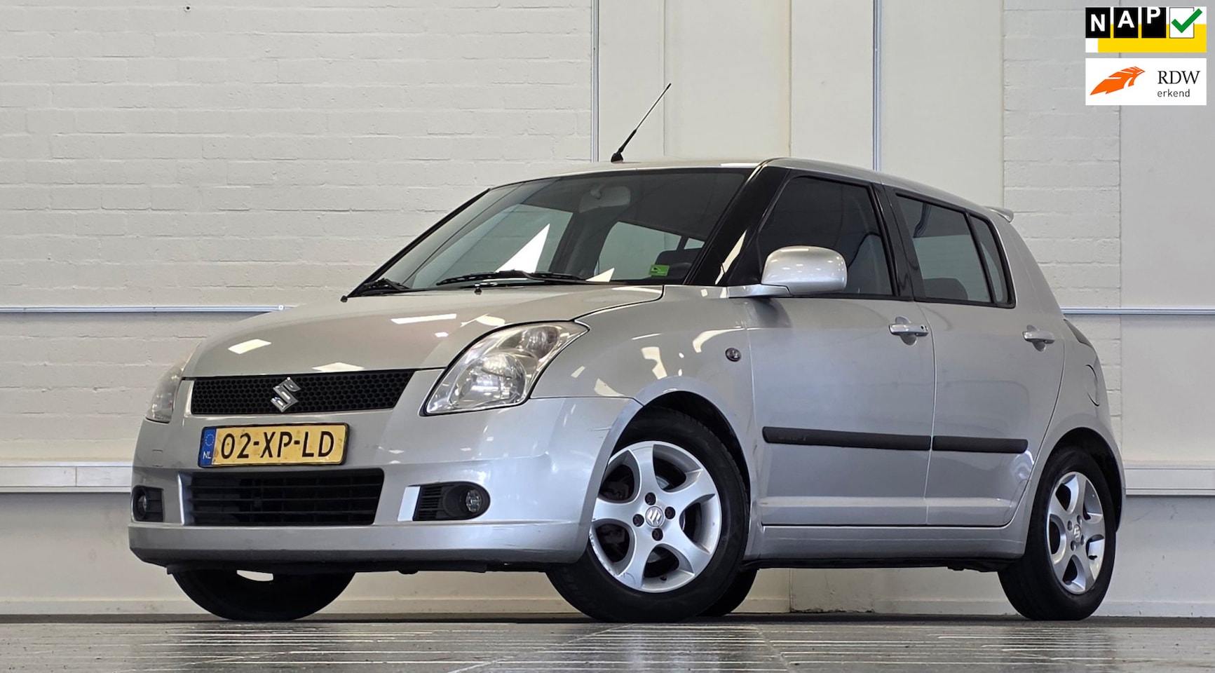 Suzuki Swift - 1.5i 16V Exclusive Automaat Lerenbekleding Parkeerhulp Garantie - AutoWereld.nl