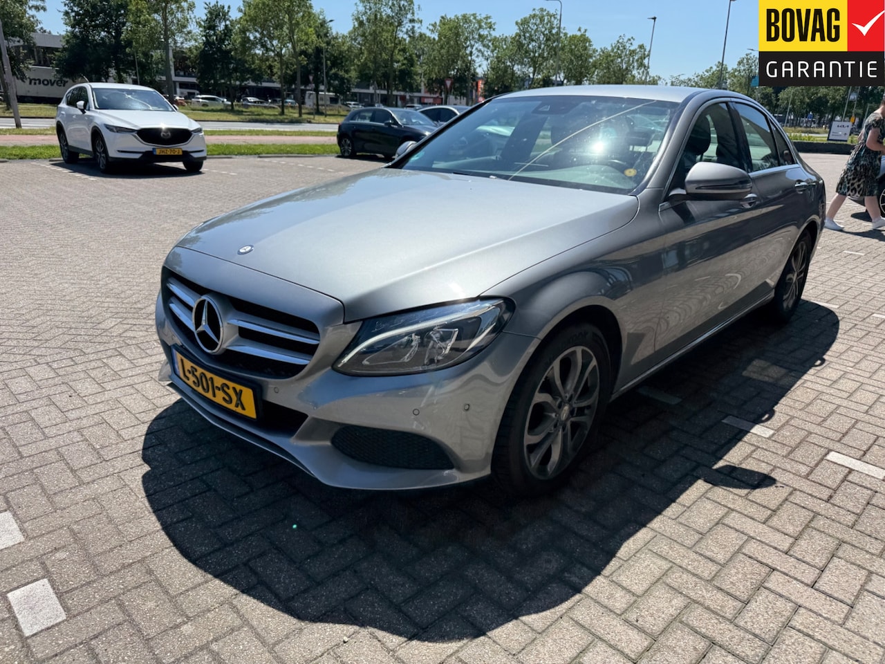 Mercedes-Benz C-klasse - 180 Ambition | 2E EIGENAAR | 12MND GARANTIE | NAVI | CRUISE | PDC | NIEUWE APK | - AutoWereld.nl