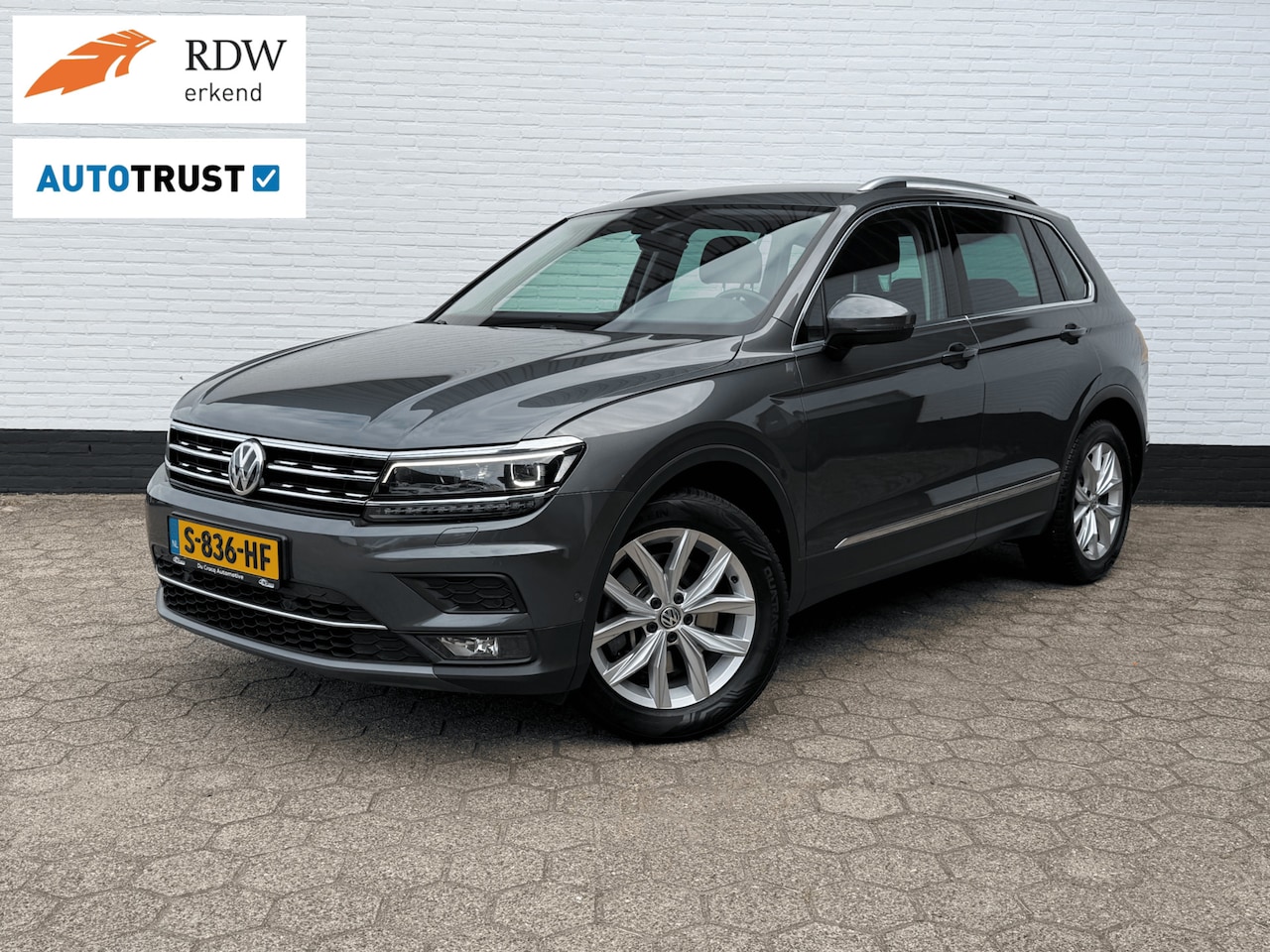 Volkswagen Tiguan - 2.0 TSI 4Motion Highline TREKHAAK l LEDER l CAMERA l ACC - AutoWereld.nl
