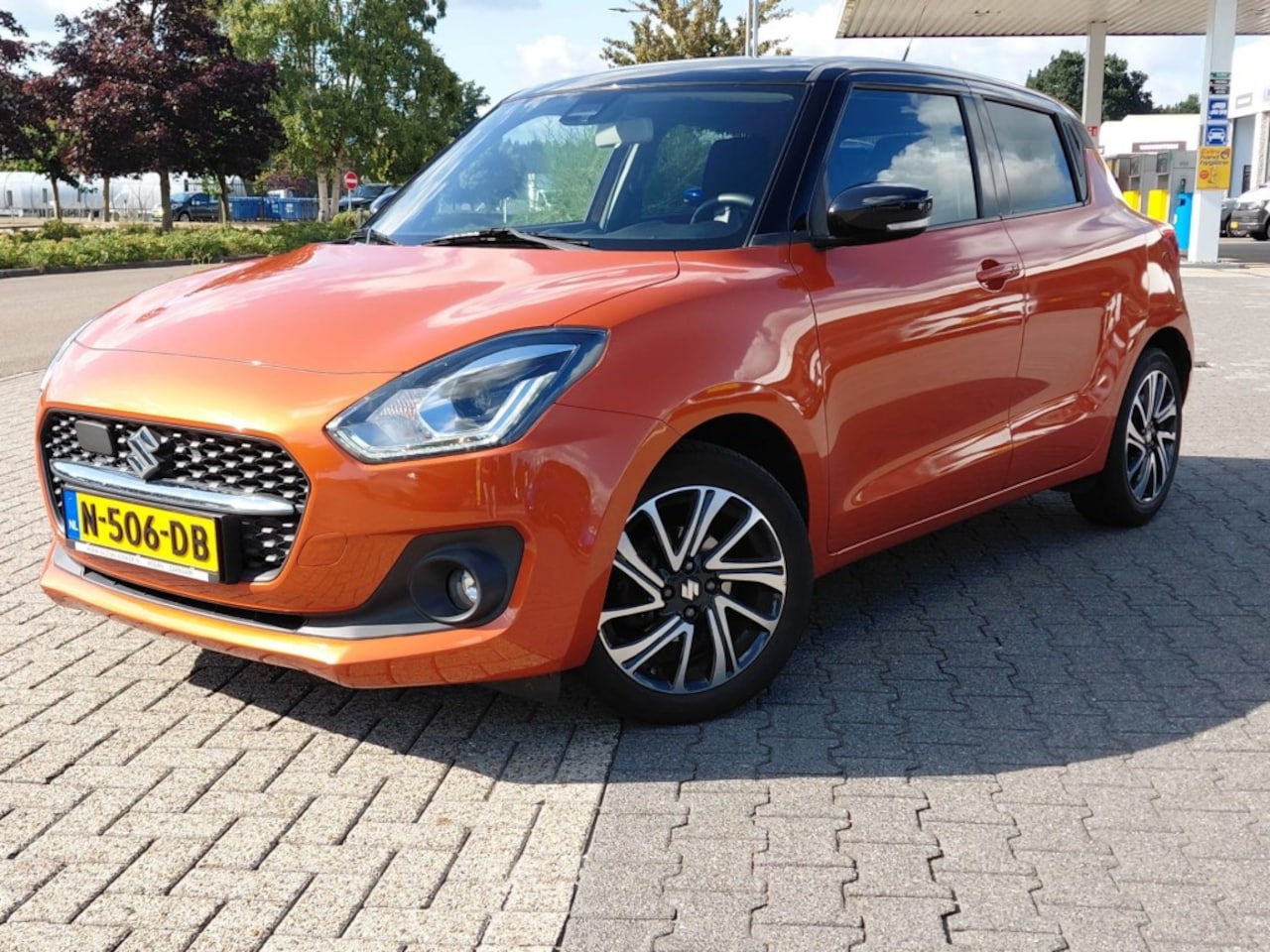 Suzuki Swift - 1.2 STYLE SMART HYBR. KEYLESS CARPLAY ECC CAMERA NAVI ADD. CRUISE - AutoWereld.nl