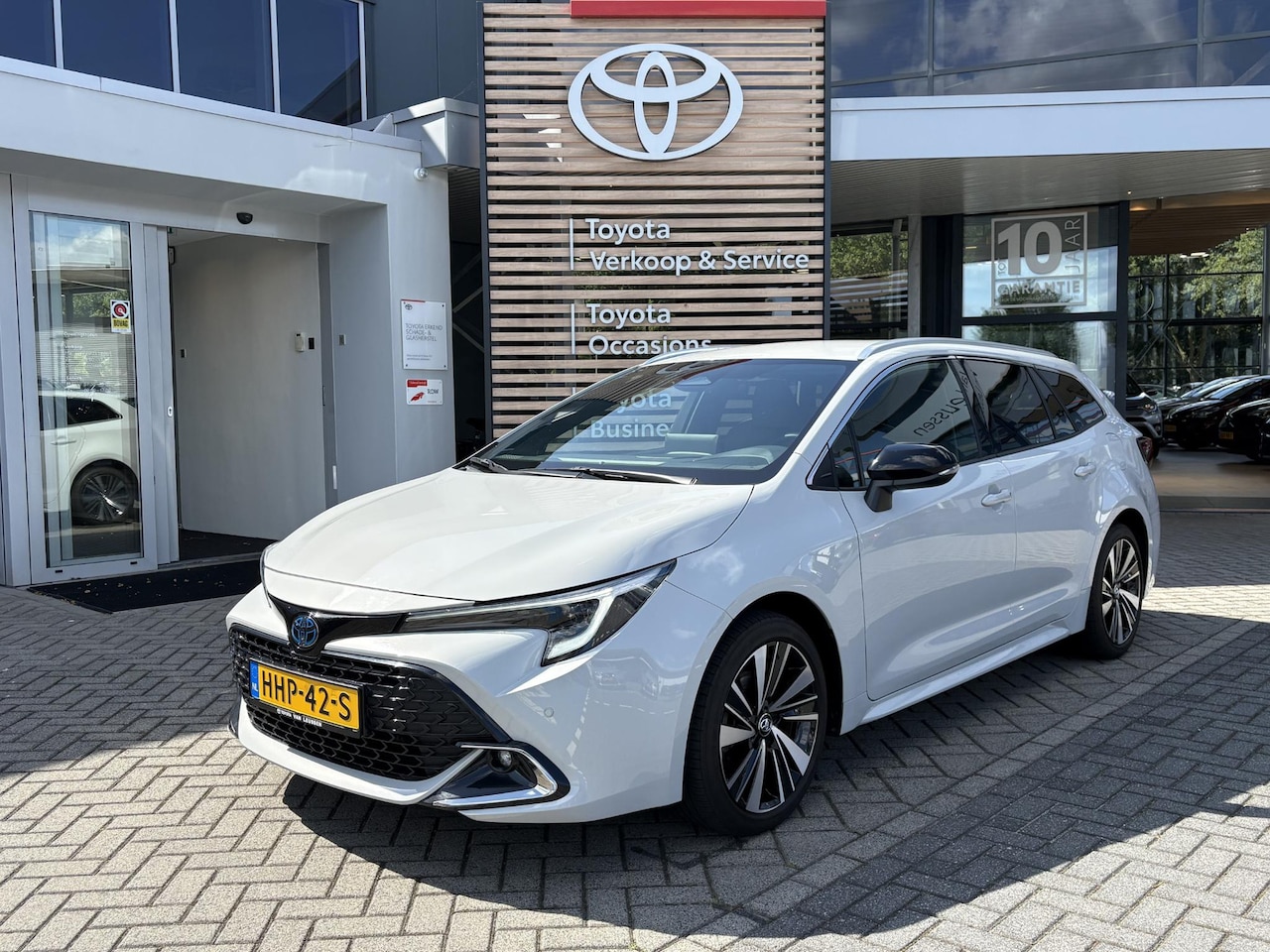Toyota Corolla Touring Sports - HYBRID 140 DYNAMIC STOELVERW APPLE/ANDROID PARK-SENSOREN 17" LM-VELGEN CLIMA AD-CRUISE NL- - AutoWereld.nl