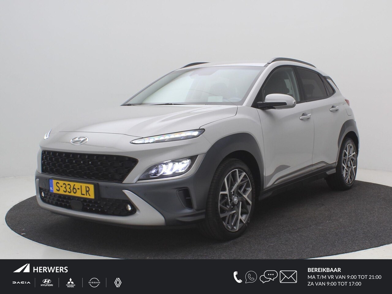 Hyundai Kona - 1.6 GDI HEV Premium / Lederen bekleding / HUD Display / Navigatie / Adaptieve Cruise Contr - AutoWereld.nl