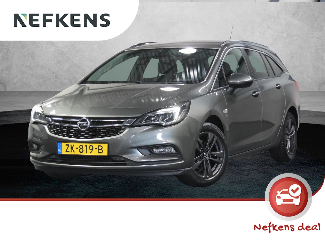 Opel Astra Sports Tourer - ST 105PK 120 Jaar Edition | 1ste eigenaar | Camera | Trekhaak | AppleCarPlay/Android | Arm - AutoWereld.nl