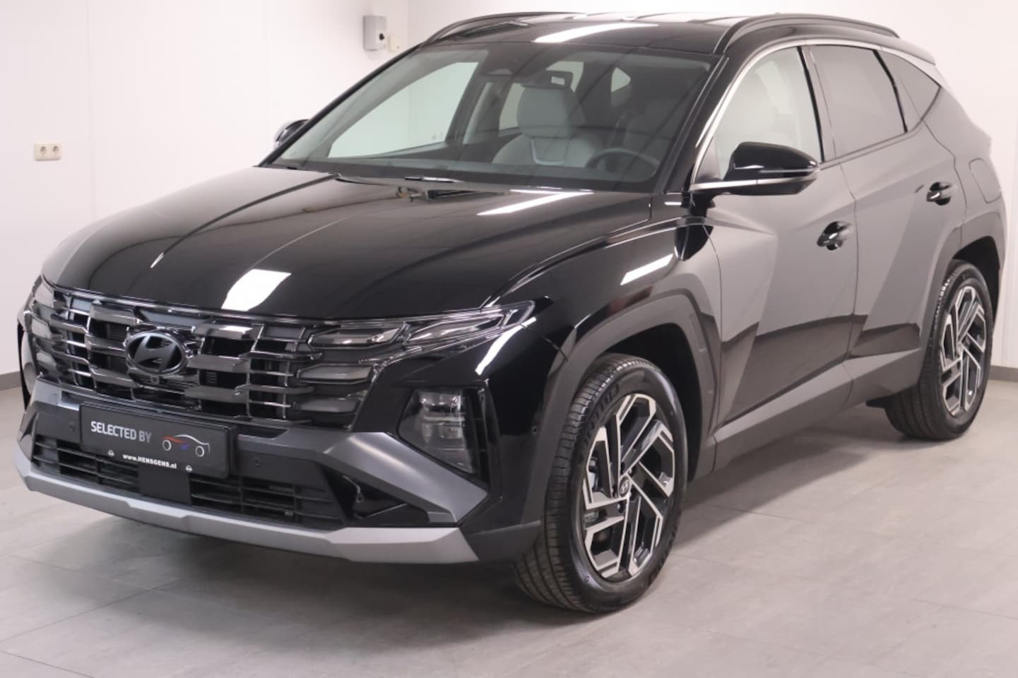 Hyundai Tucson - 1.6 T-GDI HEV Premium 1.6 T-GDI HEV Premium - AutoWereld.nl