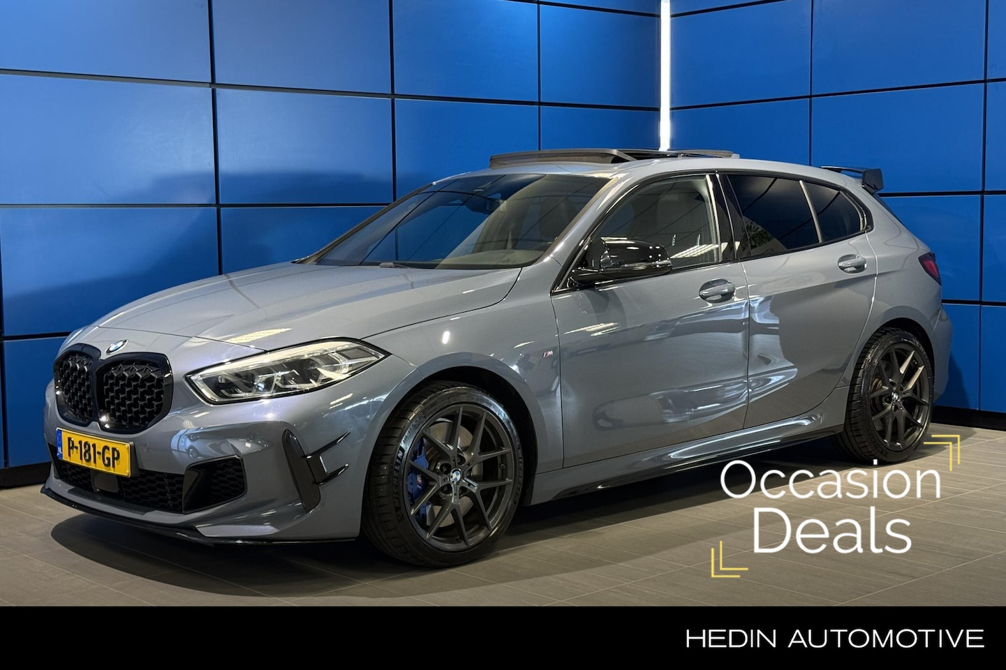 BMW 1-serie - M135i xDrive High Executive Panoramadak|stoelverwarming|achteruitrijcamera|AGR stoelen - AutoWereld.nl
