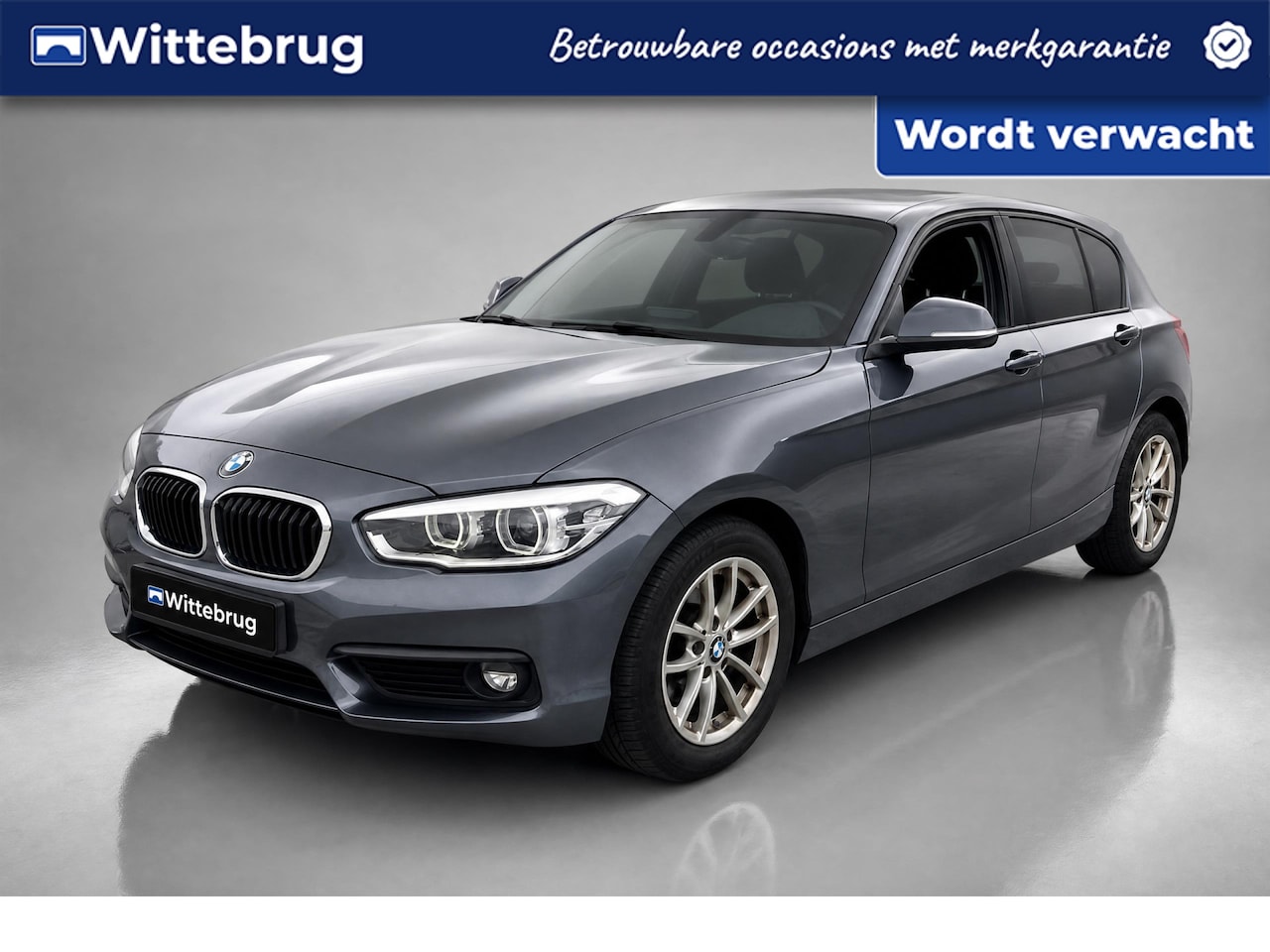 BMW 1-serie - 118i Executive / Navigatie / Climate controle / Parkeersensoren achter / Lichtmetaal 16 i - AutoWereld.nl