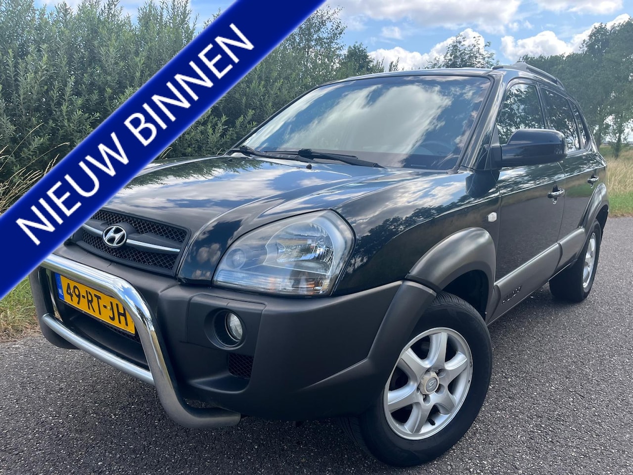 Hyundai Tucson - 2.0i Dynamic 2.0i Dynamic - AutoWereld.nl