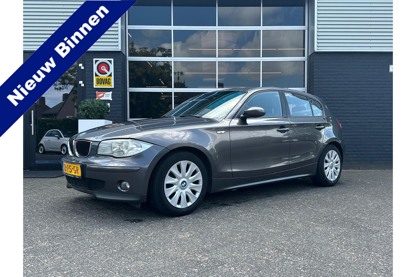 BMW 1-serie - 118d High Executive 118d High Executive, Airco, Cruise, Radio, NAP - AutoWereld.nl