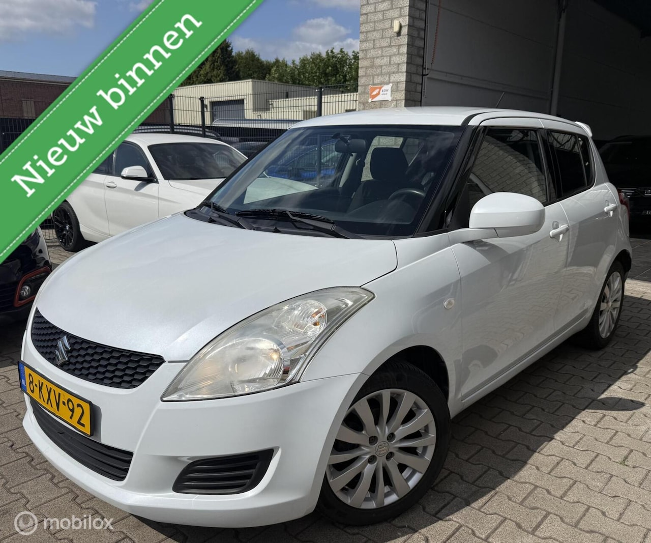 Suzuki Swift - 1.2 Bandit EASSS / BJ 2013 / 5DRS / N.A.P - AutoWereld.nl