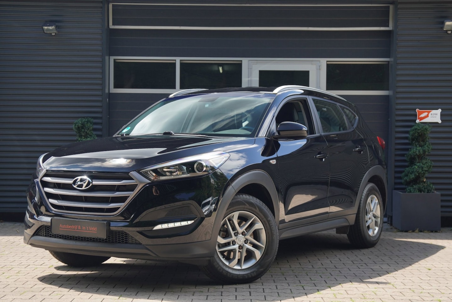 Hyundai Tucson - 1.6 GDi NAVI CAMERA STOELVERW. LED PDC - AutoWereld.nl