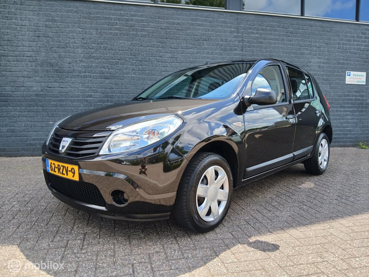 Dacia Sandero - 1.2 85.000Km Nap/Koude Airco/Apk 07-'27 - AutoWereld.nl