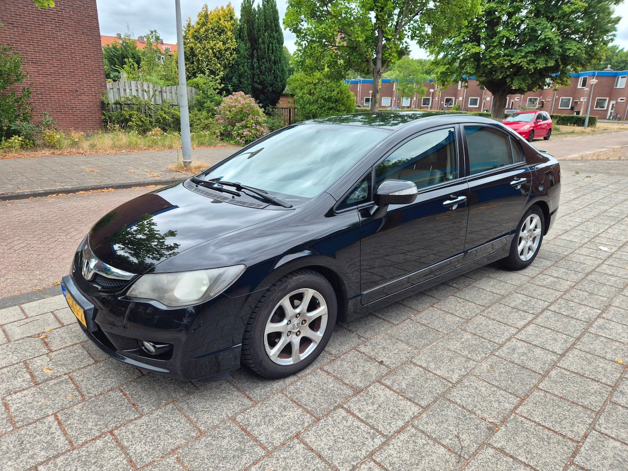 Honda Civic - 1.3 IMA Hybrid Elegance Leder Cruise - AutoWereld.nl